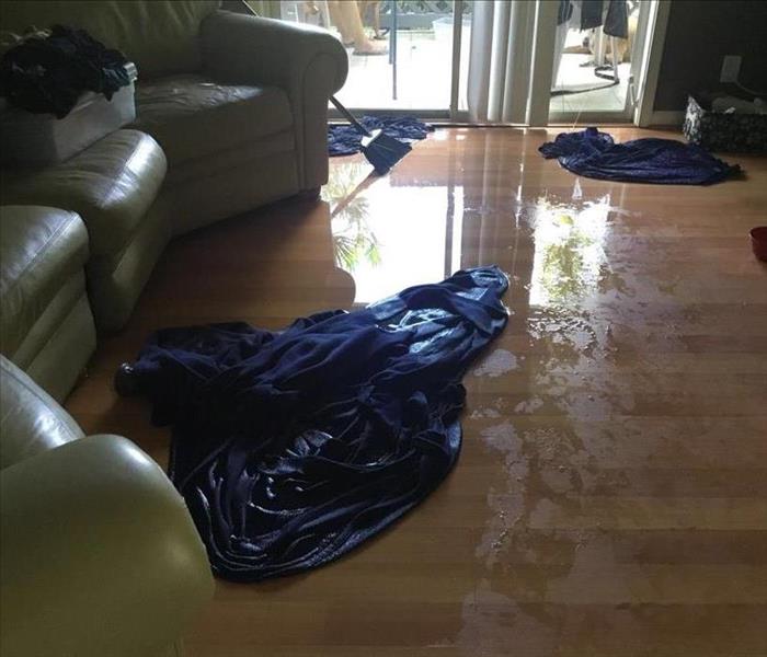 Standing water on the floor of a Delray Beach home.