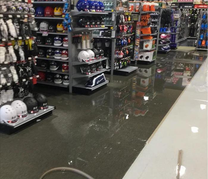 Standing water on the floor of a store in Delray Beach, FL